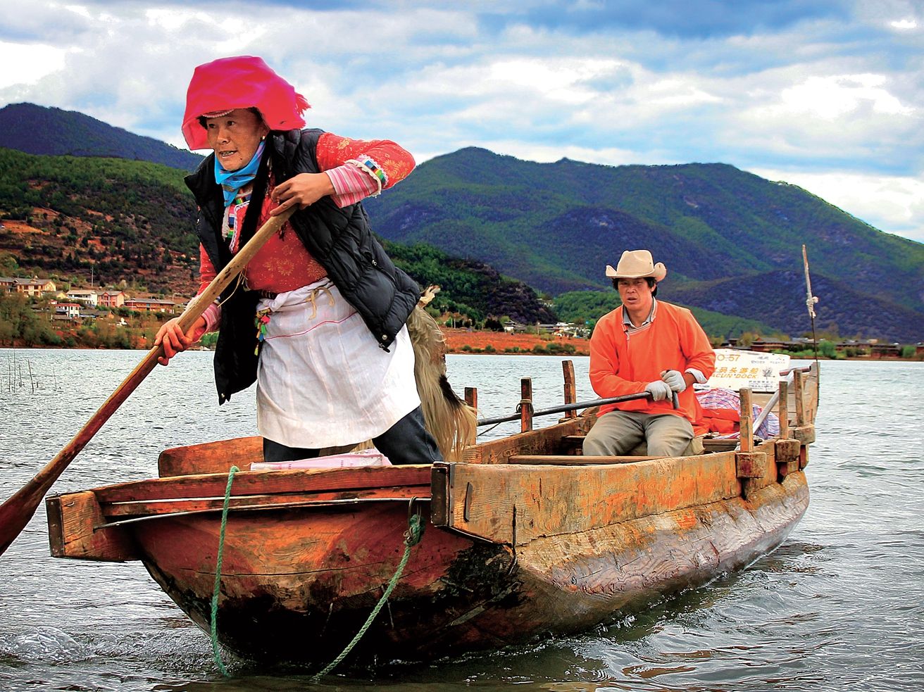 Mosuo Family on a boat