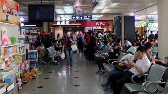 A congested waiting area at an airport. 