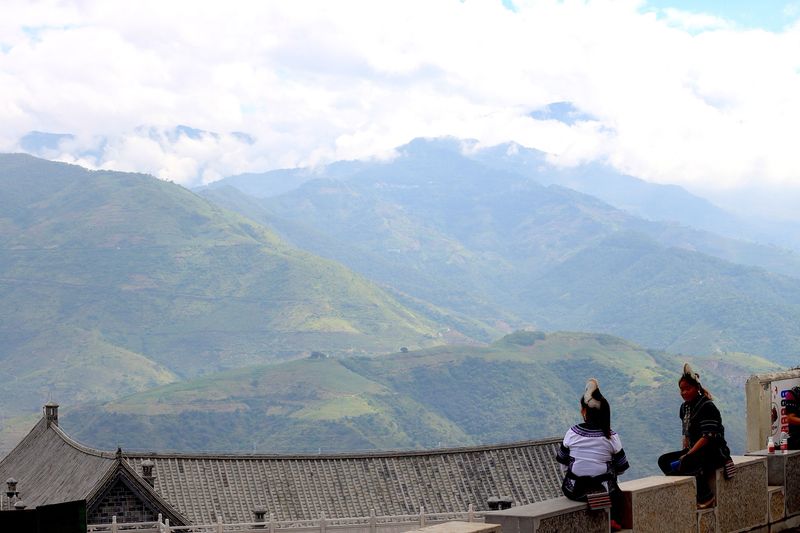 Hani women looking over into the Ailao mountains where the horse gangs of yunnan used to roam