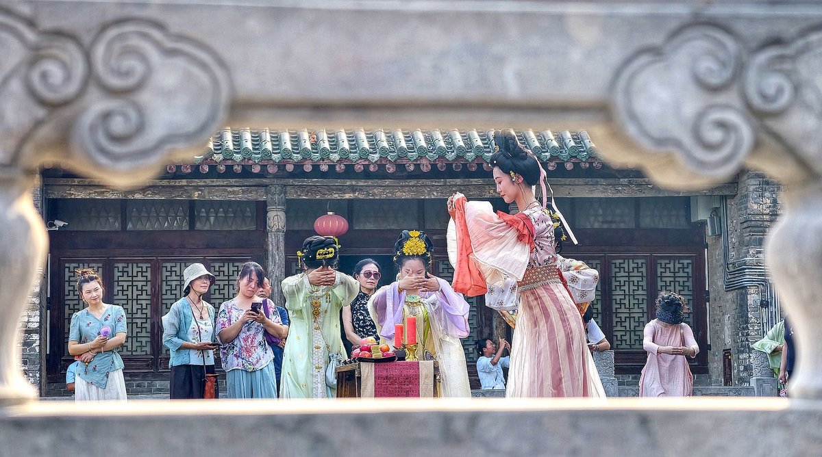 a recreated Qixi ritual ceremony in Henan