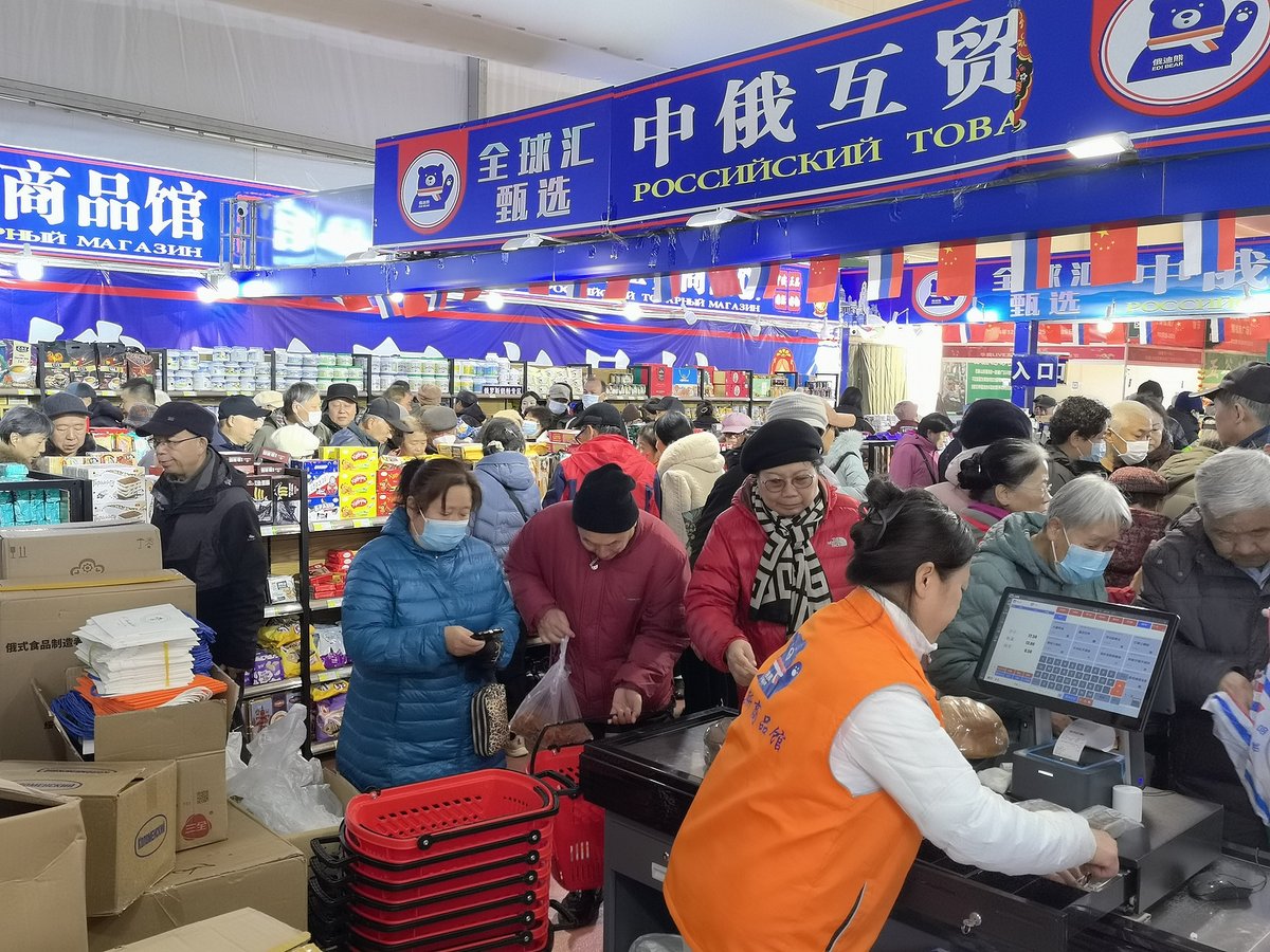 A Russian shop Beijing is packed with Chinese customers purchasing Russian goods