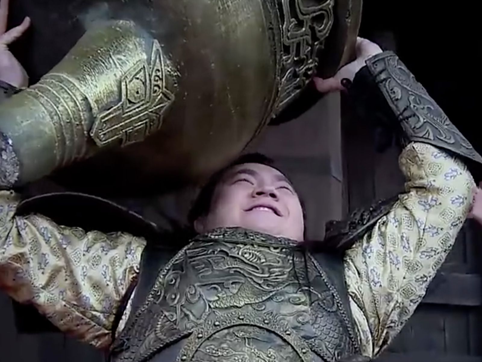 emperor holding a vessel