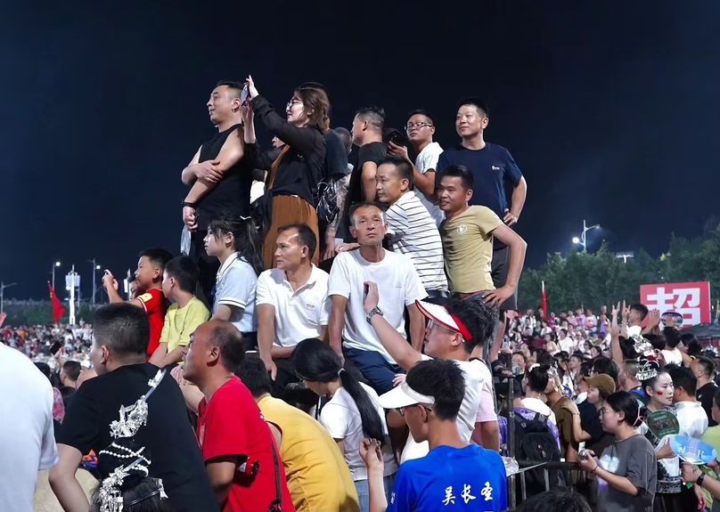 Spectators at village soccer match in Guizhou, China