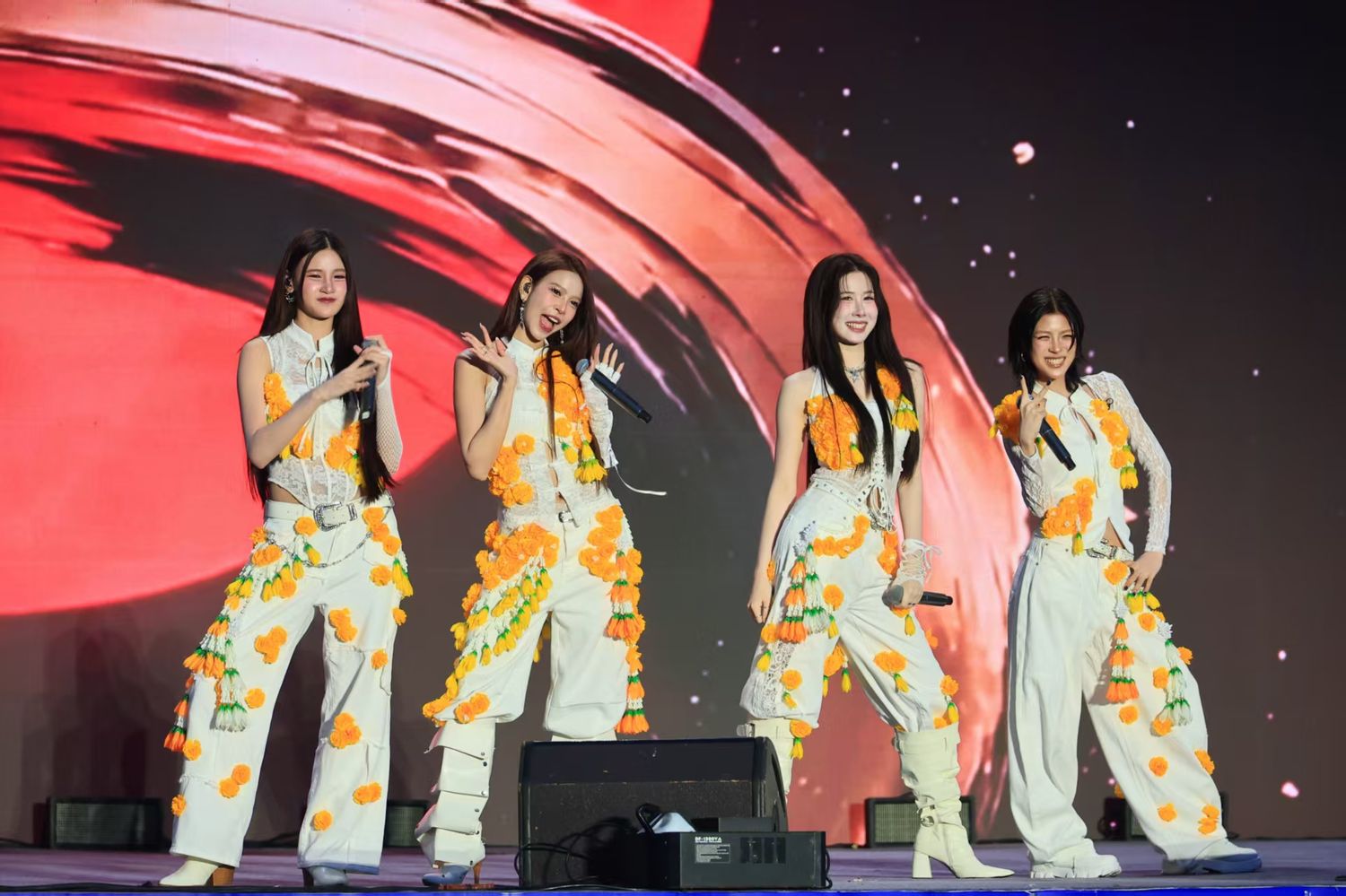 Thai pop group THX livens up the opening ceremony with a popular Chinese hit