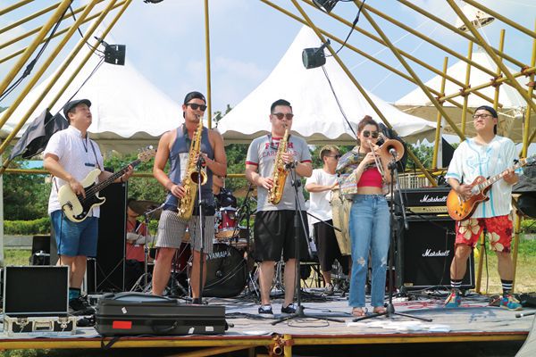 Chinese Ska-punk band The Brickska on stage performing. 