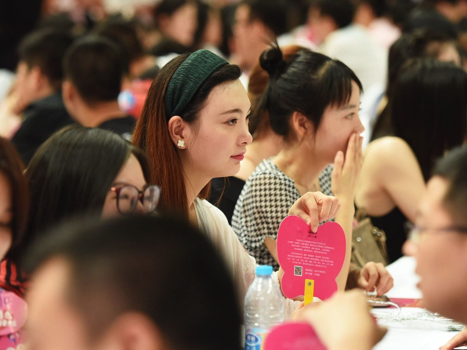 Young Chinese at speed dating event