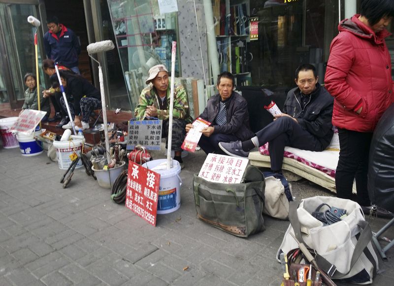 Migrant workers looking for employment in Guiyang, China’s elderly migrant workers