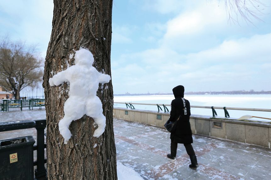 Residents get creative with snow after a blizzard in Harbin, Heilongjiang