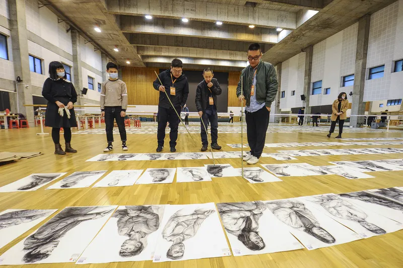 Examiners judging over 20,000 students' works during the yikao at China Academy of Art