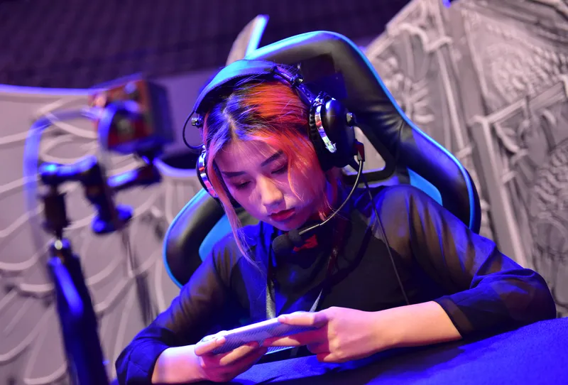 Female esports player competes
