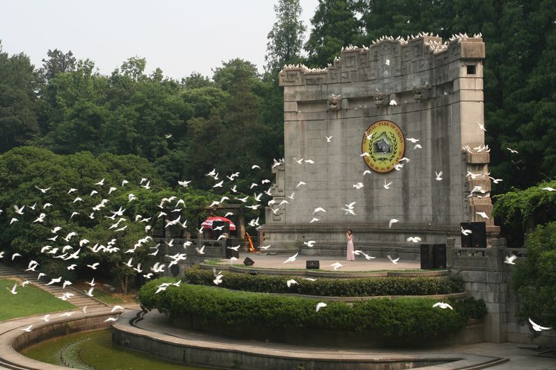 Nanjing’s Music Stage, often packed with tourists and pigeons, China's reverse travel holiday trend