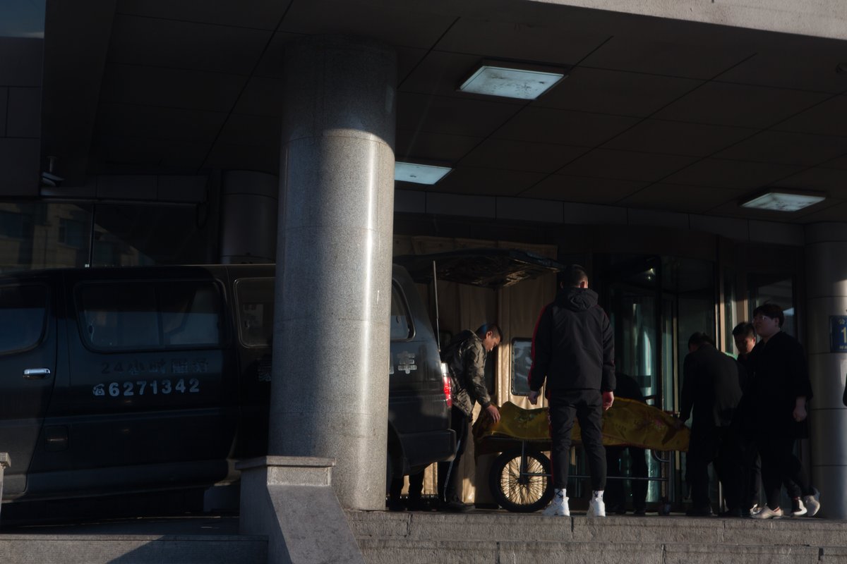 China’s competitive funeral business, Jilin body-transport workers at a hospital