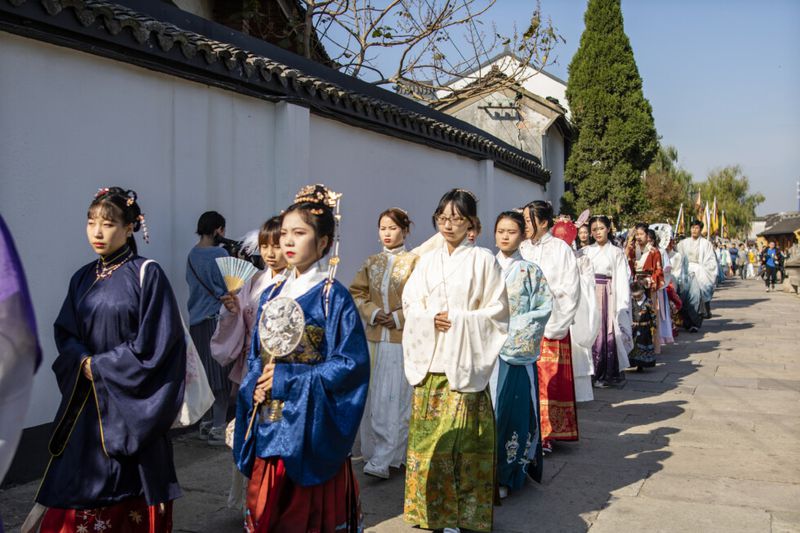 Chinese women wearing hanfu attire. 