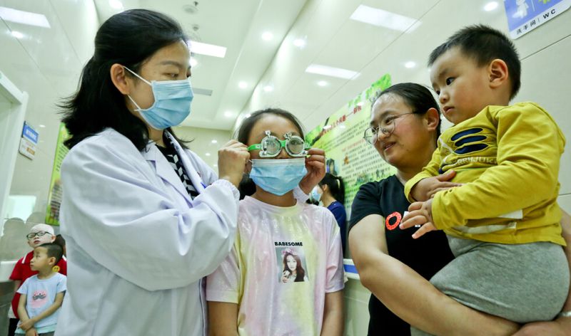 Chinese family goes in for eye examination 