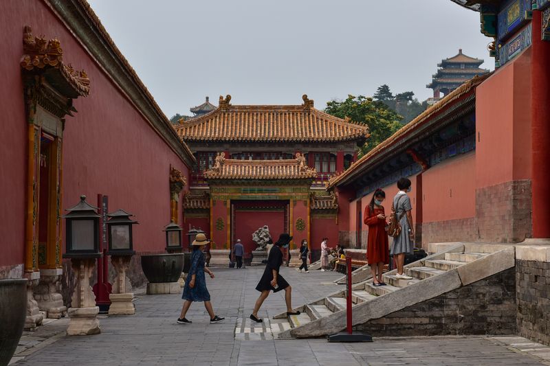 Tourists walking to the Palace Museum in 2021