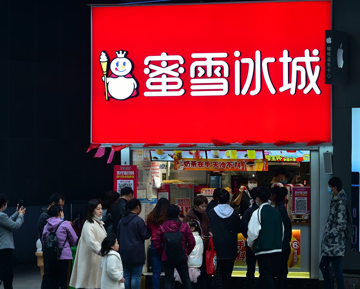 Customers queue outside a Mixue Bingcheng in Shenyang, Liaoning province, Chinese small-town budget brand