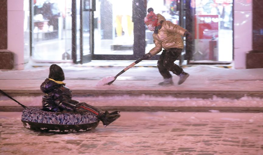 Residents of Harbin find creative ways to get around town after a blizzard