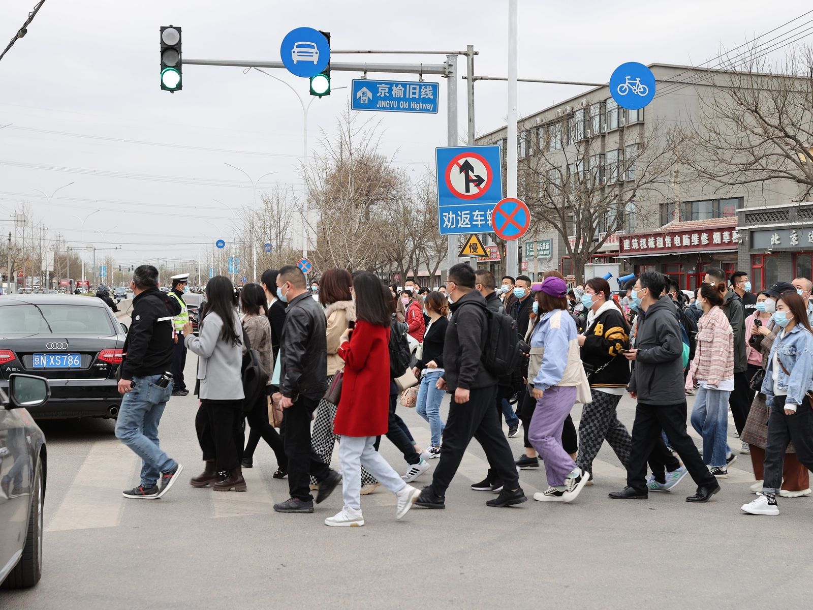 Commuters crossing the street