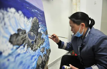 Artists in Beijing painting
