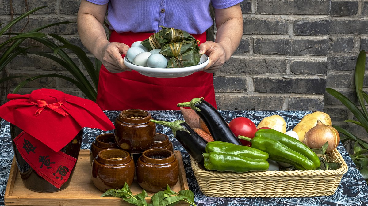 Salted duck eggs have gained popularity as a holiday food across China, often enjoyed alongside zongzi during the Dragon Boat Festival
