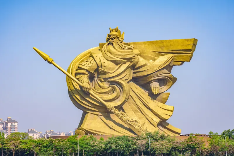 A massive bronze statue of Guan Yu in Jingzhou, Hubei province. The martial hero is usually depicted with a long, flowing beard.