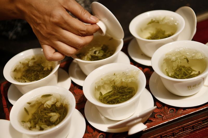 Traditional jasmine tea served in cups