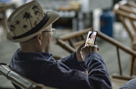 Elderly people on phone