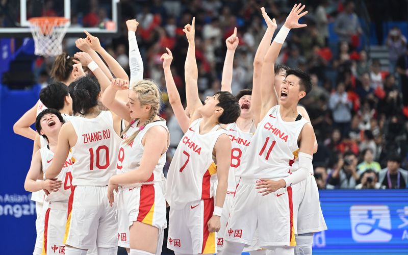 Chinese women's basketball team celebrating