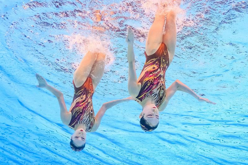 twin sisters Wang Qianyi and Wang Liuyi won China’s first gold in the duet artistic swimming