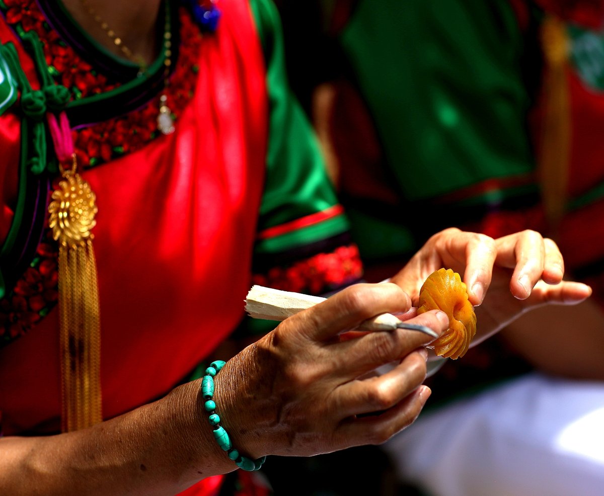 Diaomei (雕梅), or carved plums, are a traditional Bai ethnic specialty from Dali, Yunnan, dating back to the Tang dynasty