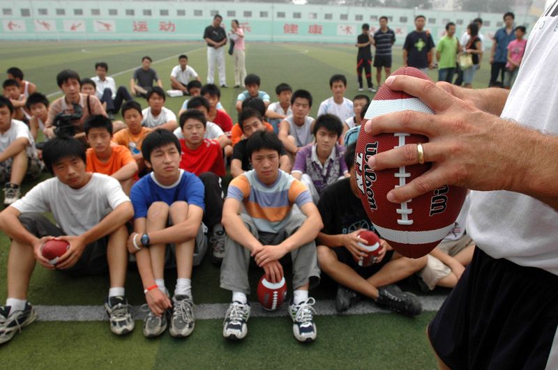 Chinese students learning American flag football in Zhengzhou