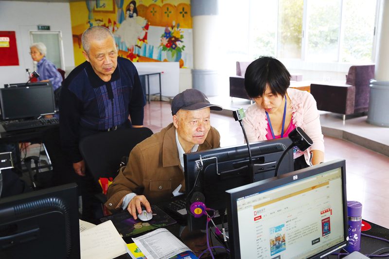 A free computer class for senior citizens at a public library in Mianyang, Sichuan province