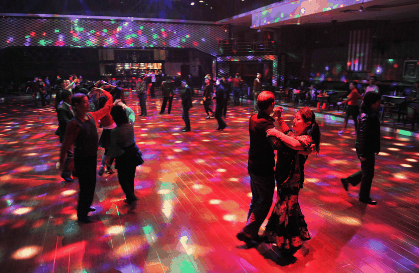 Chinese seniors were enjoying dancing in a dance hall in Nanchang, Jiangxi