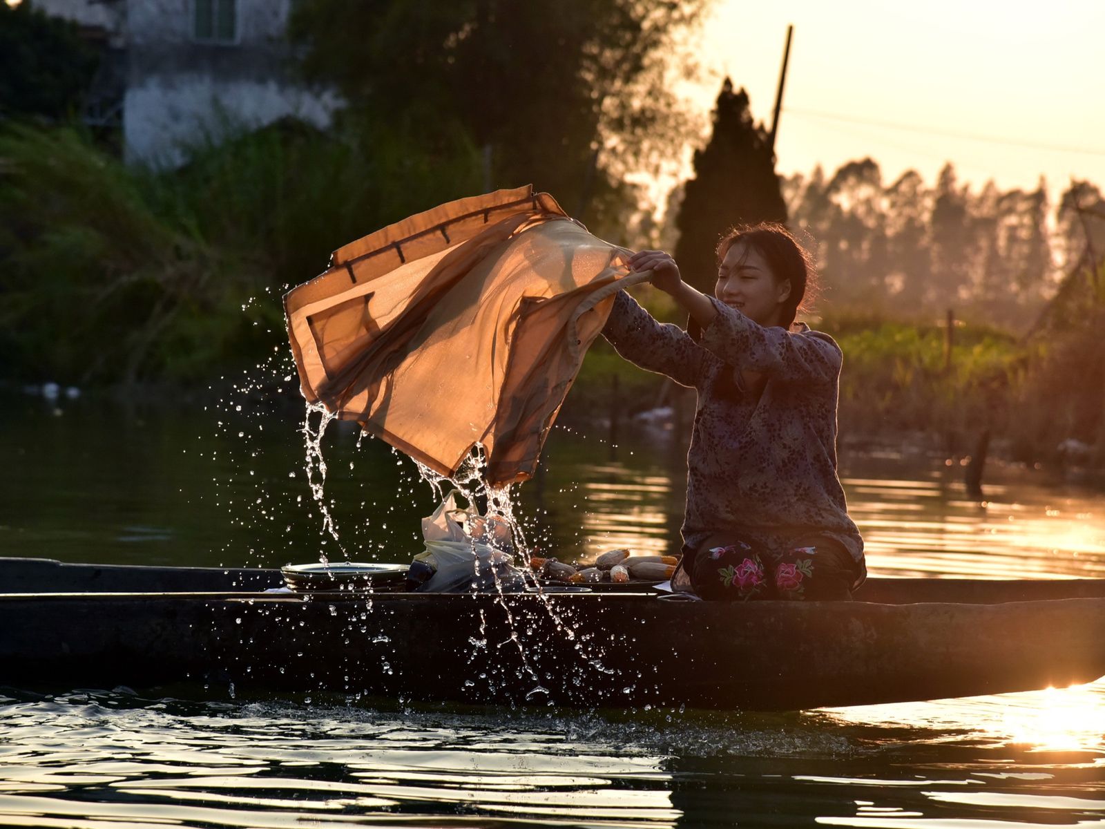 Girl washing clothes in Guangdong