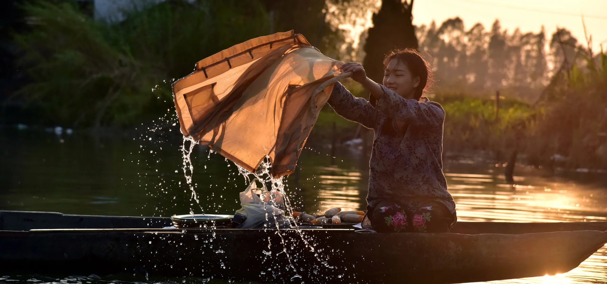 Girl washing clothes in Guangdong