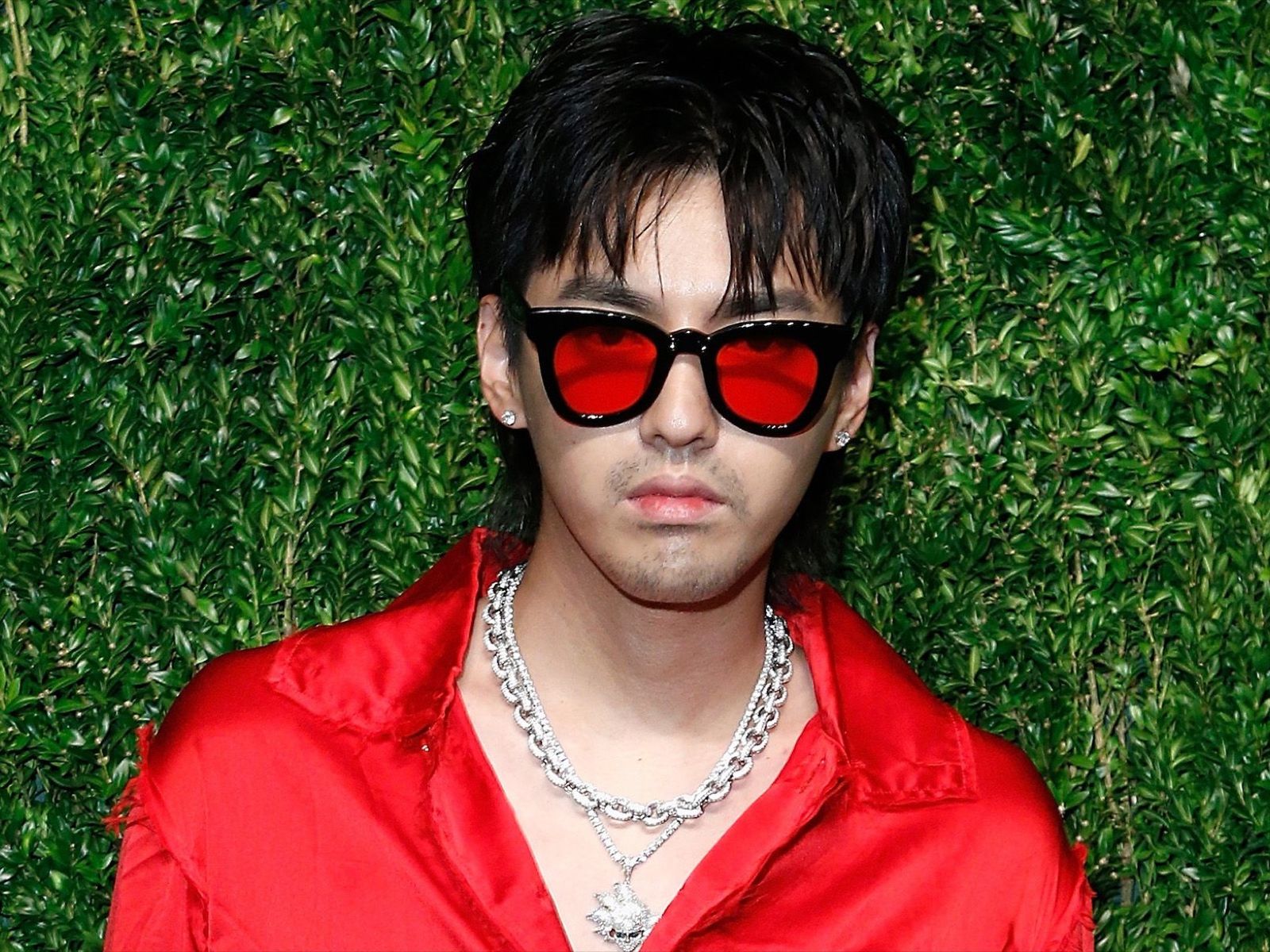 Kris Wu posing in red