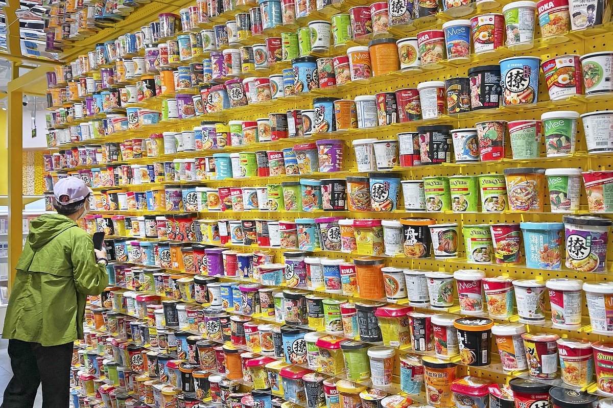 A display of various instant noodle brands, both domestic and foreign, at a shopping center in Beijing