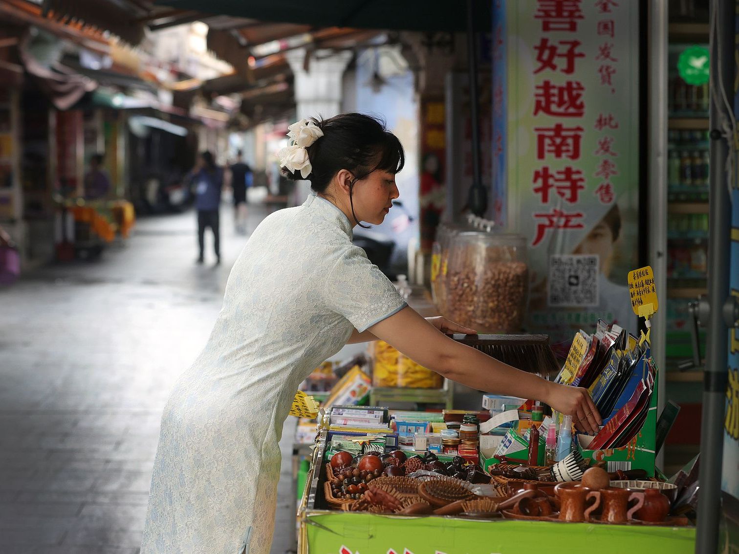 Woman selling specialty products from Vietnam in Dongxing, Guangxi