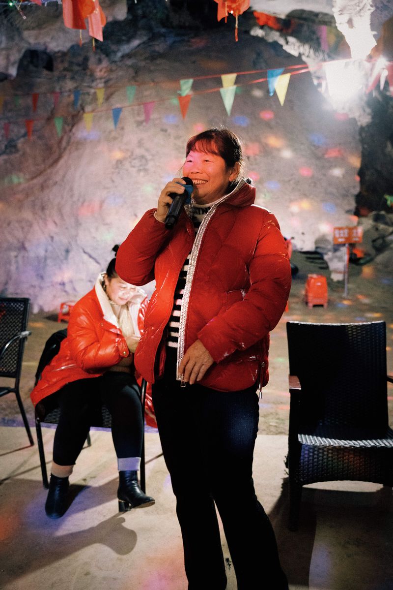 Chinese villagers enjoy singing in the caves for their echo effect