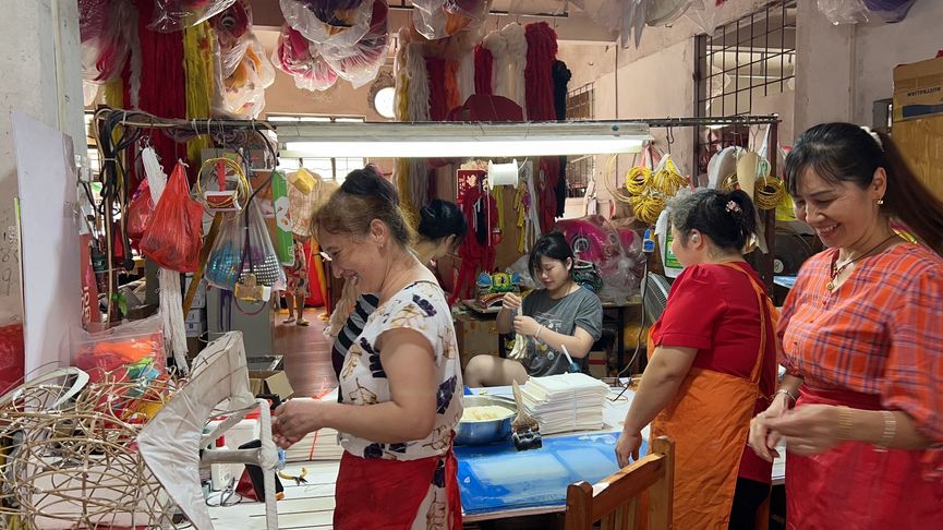 Female artisans at Chinese dancing lion factory