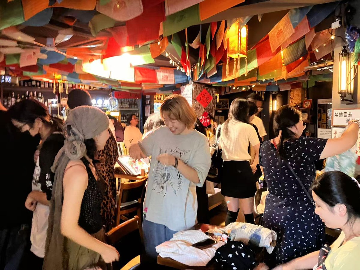 a monthly secondhand fair in a Nanjing bar