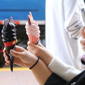 Young Chinese taking photos gelato