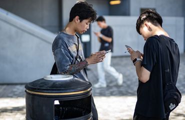 Young people smoking Hong Kong