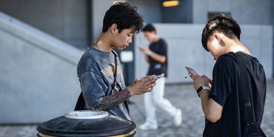 Young people smoking Hong Kong