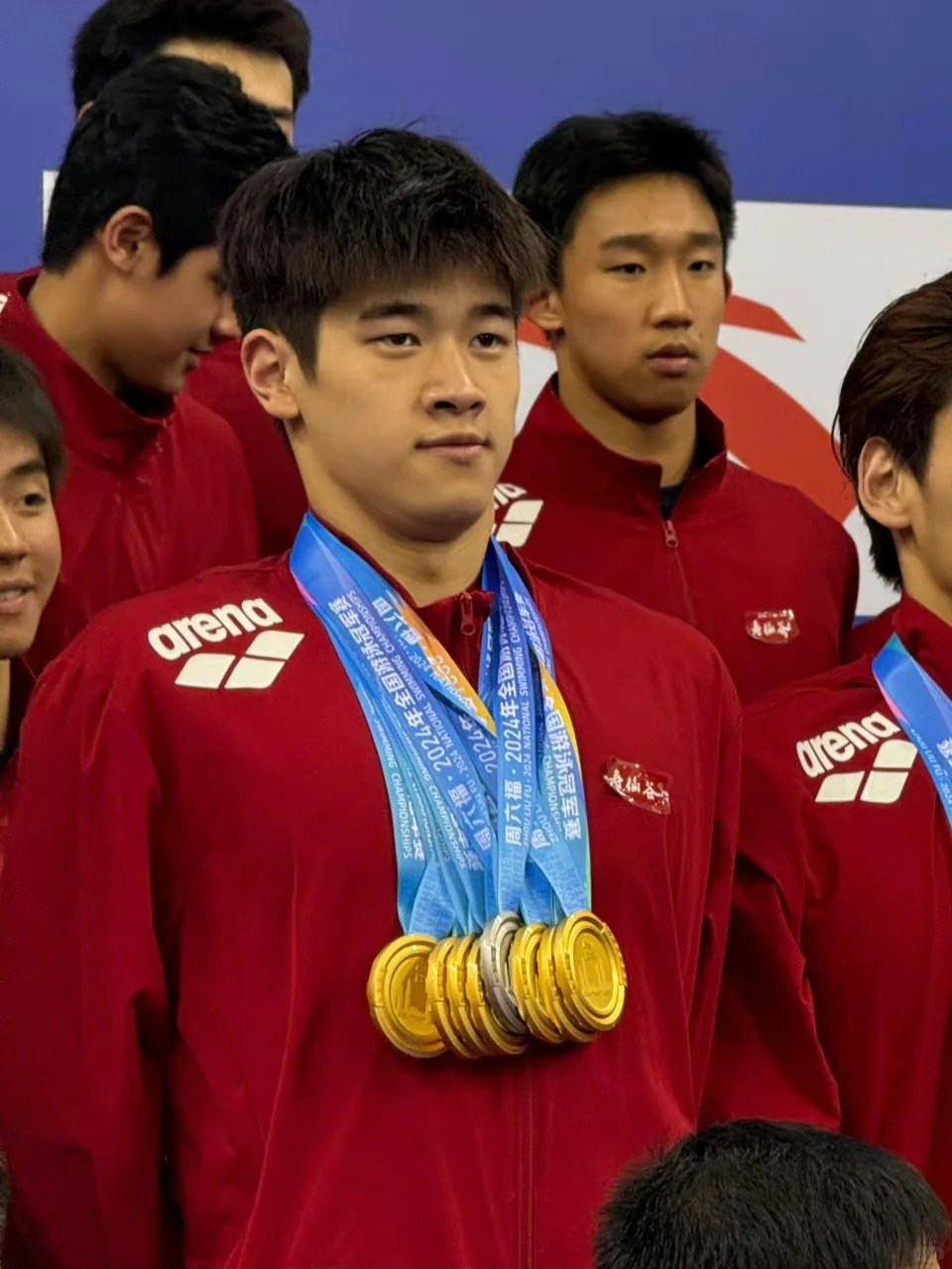 Pan Zhanle, China olympic Gen-z athlete donning gold medals