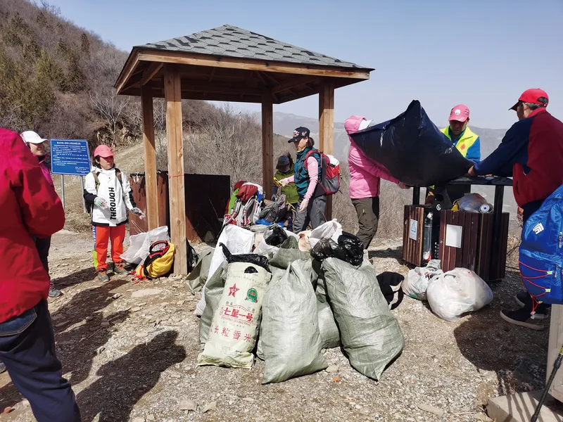 Many inexperienced hikers have not gotten in the habit of taking their trash with them, adding to the tourism garbage in China