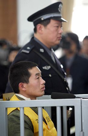 Huang Yong, charged with murder of 17 boys but believed to have killed many more, faces trial