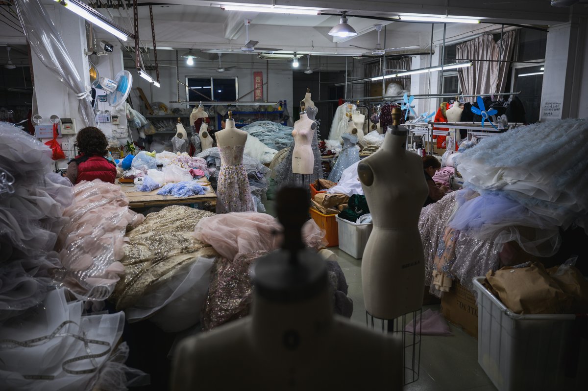 Piles of wedding and evening dresses at a factory in Chaozhou, China’s southeastern province of Guangdong