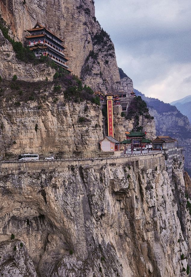 Daluo Palace is carved directly into the cliffside and a modern elevator whisks visitors to the entrance in seconds.