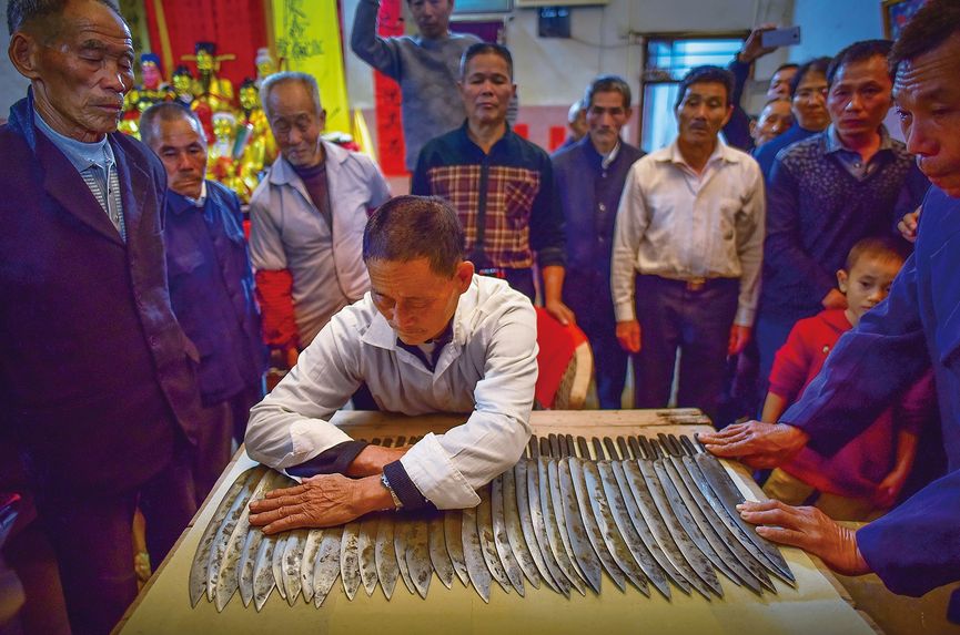 Villagers start sharpening and testing the knives three to five days before the festival